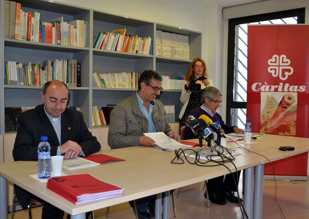 Jaume Mayoral, delegat de Càritas a la Diòcesi d'Urgell; Ramon Baró, director de Càritas a Lleida, i Josep Vidal, director de Càritas Diocesana a Solsona